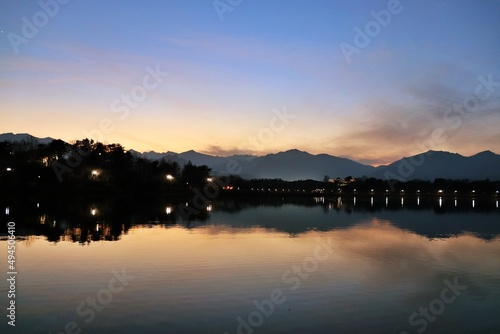 reflection of sunset on the lake © Soonyong
