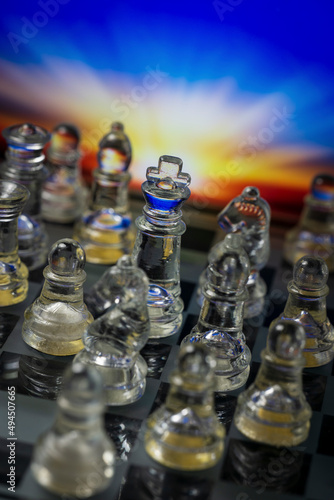 Glass chess and color sunset backdrop macro