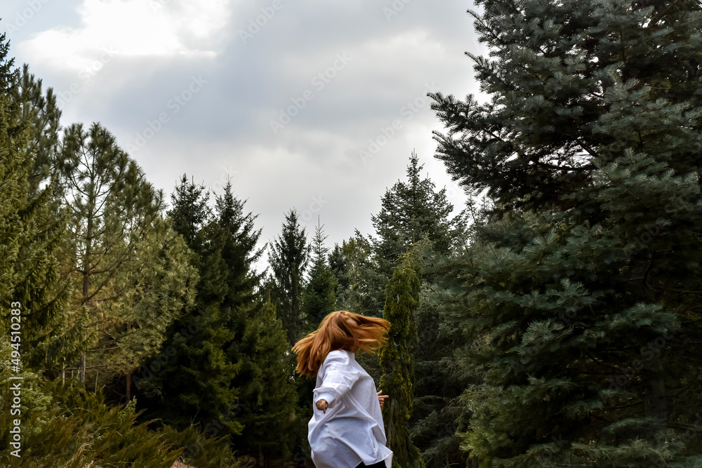 Naklejka premium person in the forest