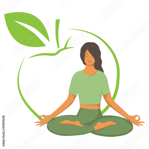 woman in yoga pose in front of green apple