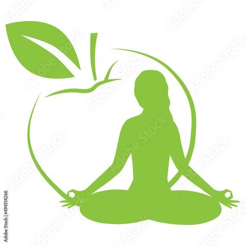 woman in yoga pose in front of green apple