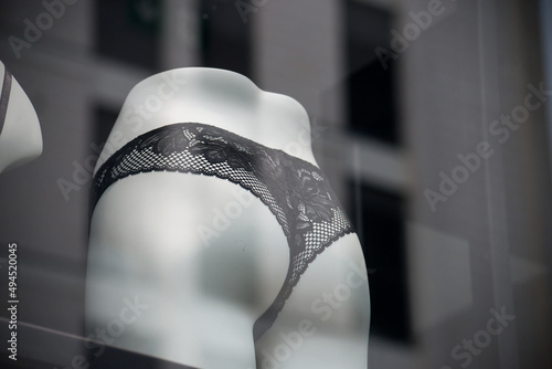 Closeup of black cheeky on mannequin in a fashion store showroom photo