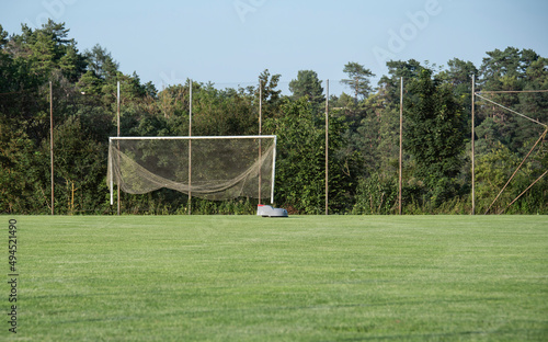 a soccer field with a robotic lawn mower