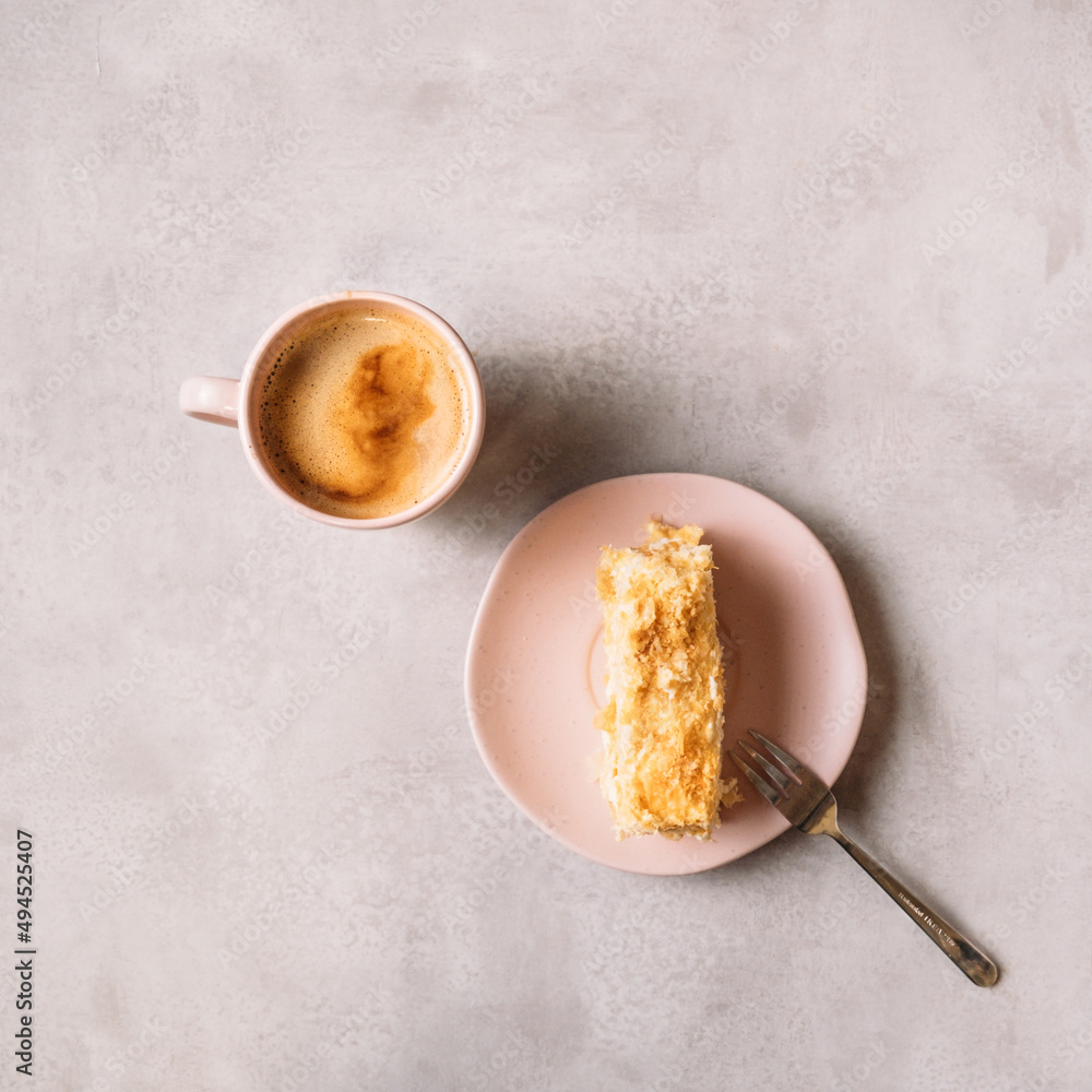 cup of coffee and piece of Napoleon Cake