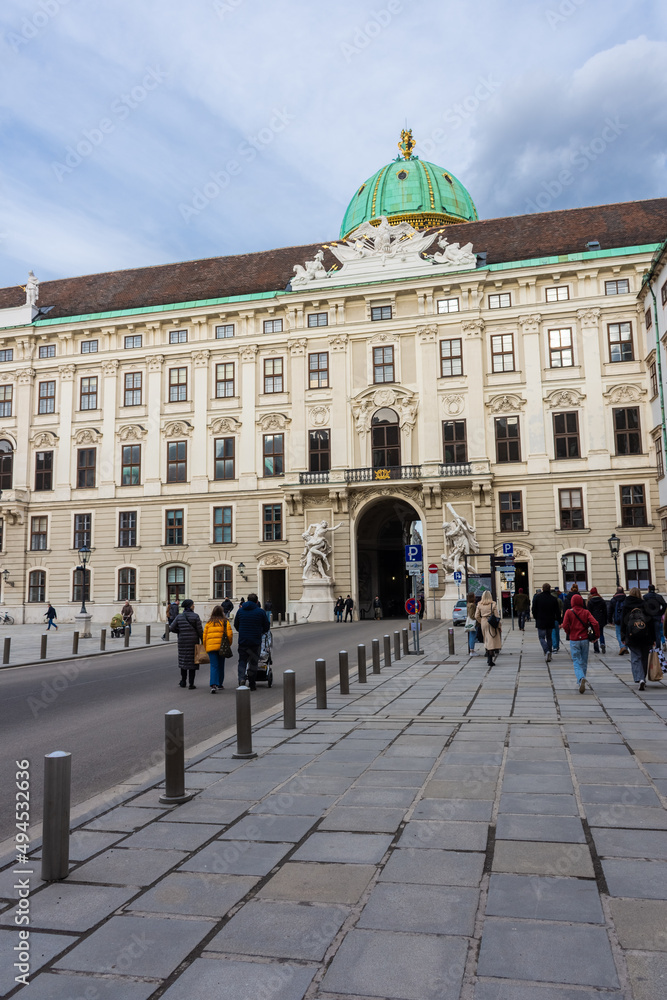 VIENNA, AUSTRIA, 19 FEBRUARY 2022 : People walking nearby the Hofburg