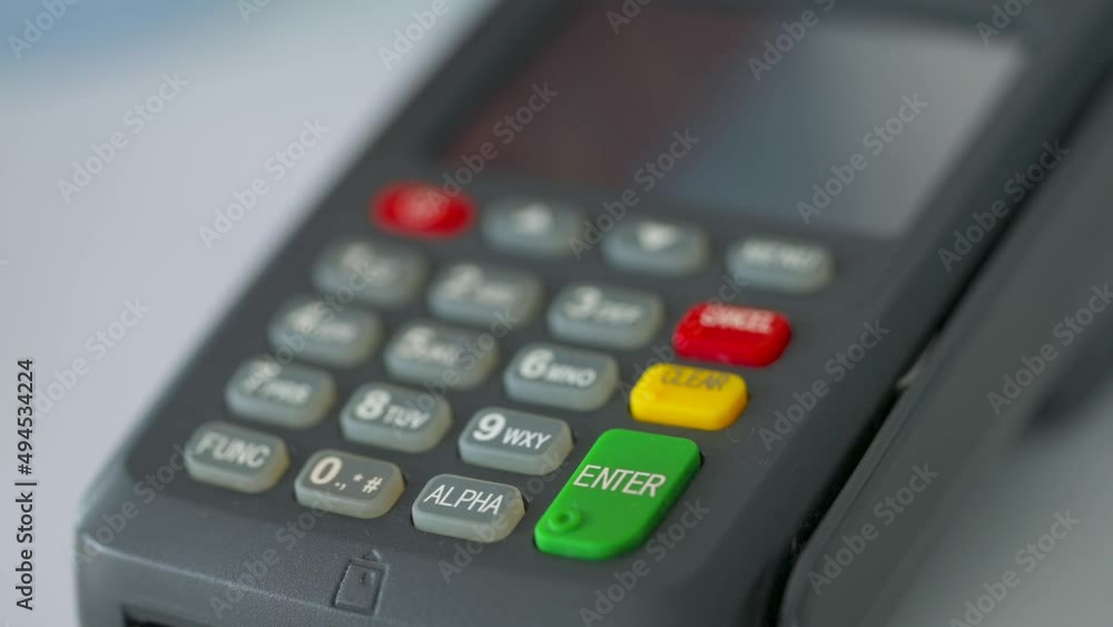Woman paying with contactless credit card. Wireless money transaction. Wireless payment Woman paying with contactless credit card. Wireless money transaction. Wireless payment