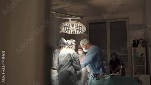 Team surgeon at work in operating room. Modern equipment in operating room. Medical devices for neurosurgery