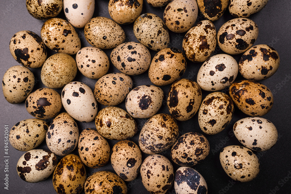Group of quail eggs as a background. Raw eggs.