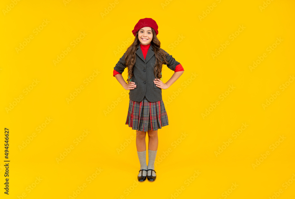 september 1. happy childhood. smart child. happy teen girl in beret full length.