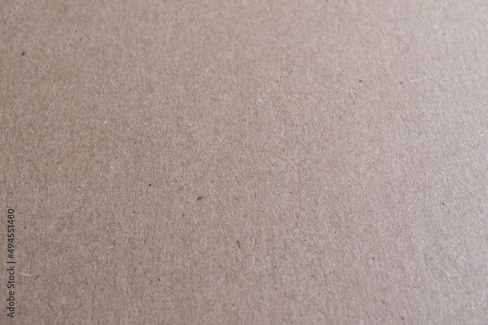 Obraz premium detalle de textura de cartón limpio café con un doblez marcado ligeramente