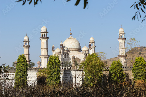Side view of the Bibi Ka Maqbara tomb against a clear blue sky in Aurangabad, Maharashtra, India photo