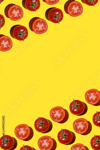 red tomatoes pattern on yellow background. Flat lay, top view. Summer concept. Vegan and vegetarian diet. Seamless Pattern with tomatoes