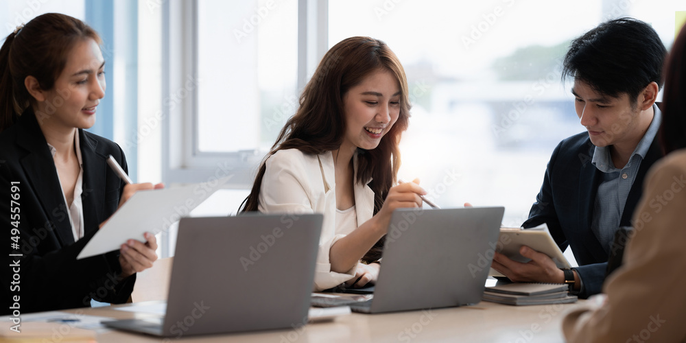 Group of Business people and Accountant checking data document on digital tablet for investigation of corruption account. Anti Bribery concept. Group of Business people and Accountant checking data document on digital tablet for investigation of corruption account. Anti Bribery concept.