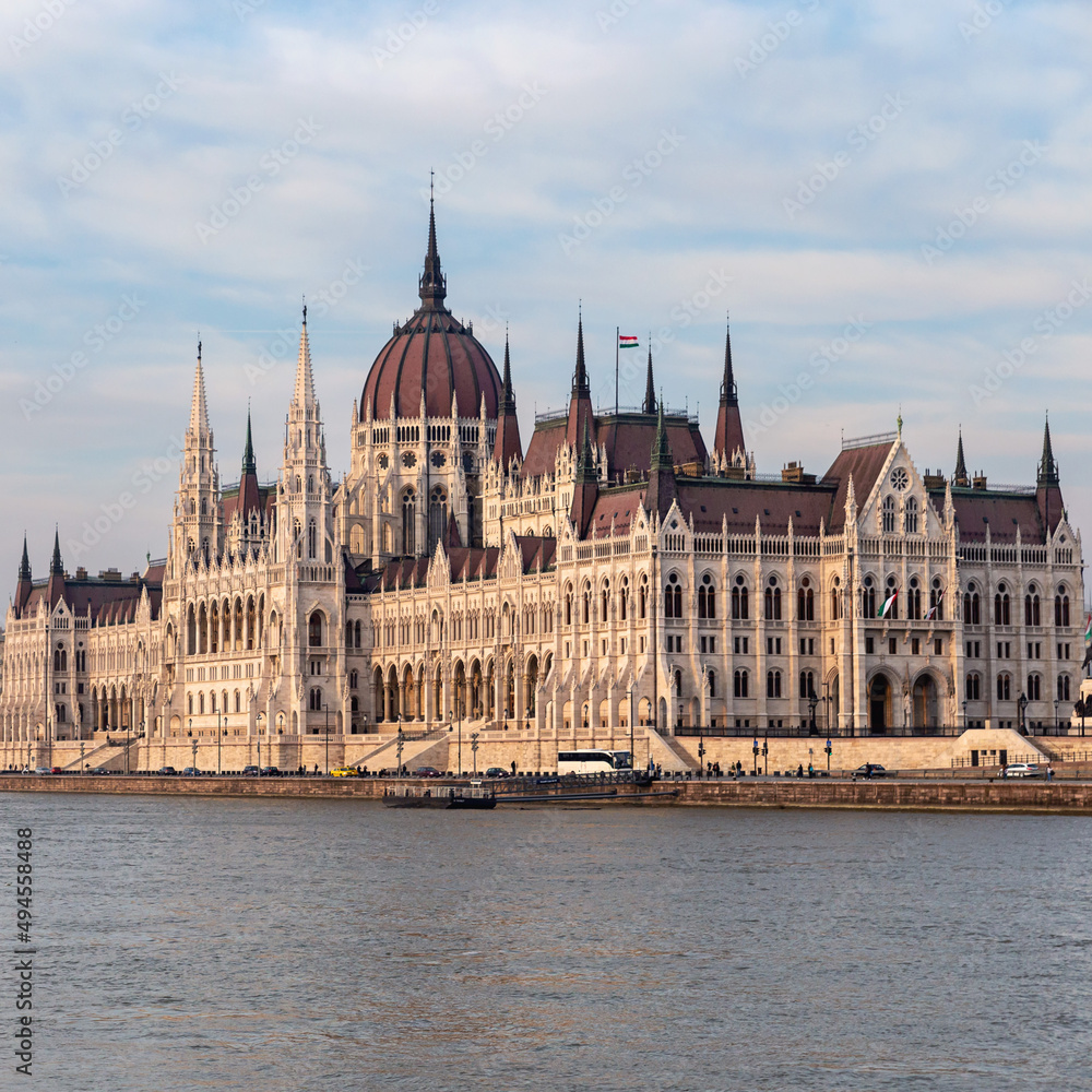 Fototapeta premium view from the Danube river to the beautiful Gothic building of the Hungarian Parliament as a symbol of the Hungarian capital