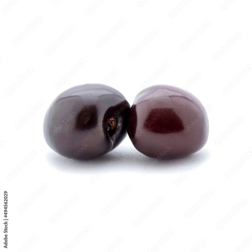 Photo of dark red cherries isolated on white background Photo of dark red cherries isolated on white background