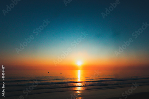 sunset on the beach © Adam