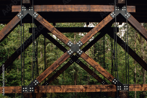 Fotografie Closeup shot of wooden cantilever bridge