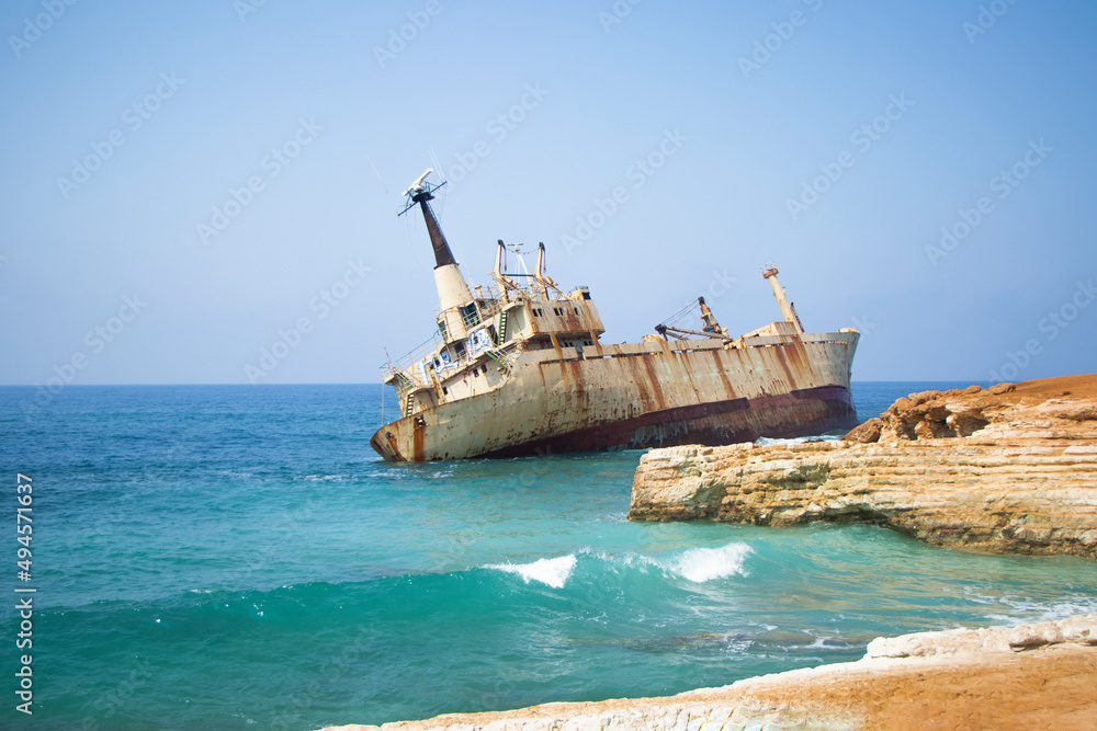 Aerial view of abandoned ship wreck EDRO III in Pegeia, Paphos, Cyprus. The rusty shipwreck is stranded on Peyia rocks at kantarkastoi sea caves, Coral Bay, Pafos, standing at an angle near the shore Aerial view of abandoned ship wreck EDRO III in Pegeia, Paphos, Cyprus. The rusty shipwreck is stranded on Peyia rocks at kantarkastoi sea caves, Coral Bay, Pafos, standing at an angle near the shore