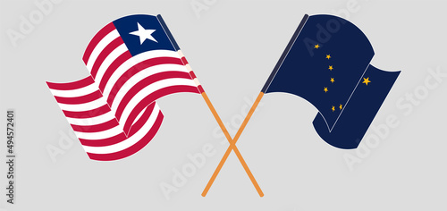 Crossed flags of Liberia and the State of Alaska. Official colors. Correct proportion