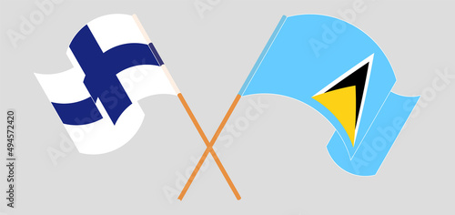 Crossed flags of Finland and Saint Lucia. Official colors. Correct proportion