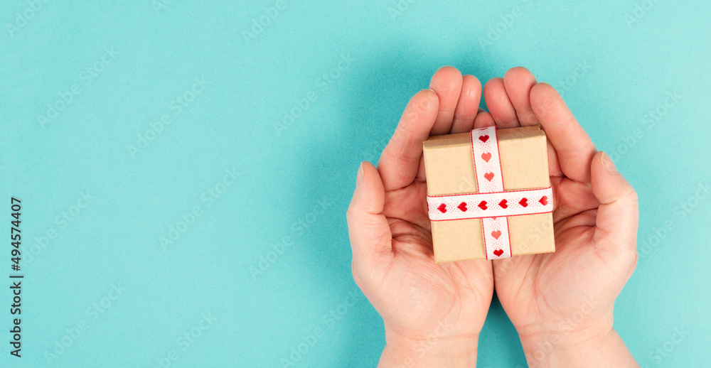 Little gift box with heart ribbon, copy space, background and greeting card for mother´s day, valentine, father´s day, birthday
Little gift box with heart ribbon, copy space, background and greeting card for mother´s day, valentine, father´s day, birthday