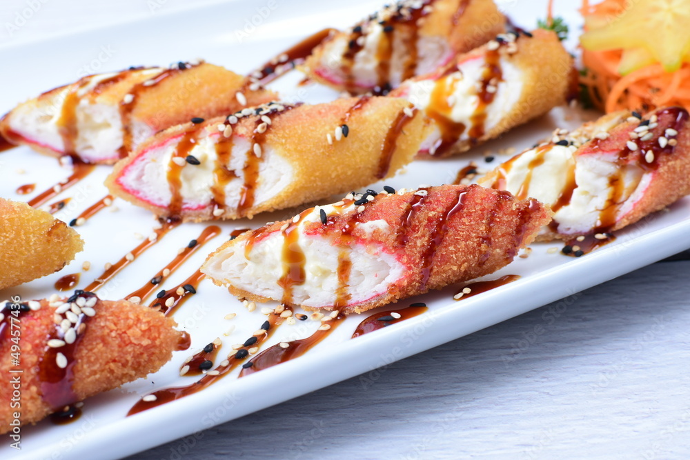 traditional Japanese food appetizer, with soy sauce, sesame seeds, vegetables traditional Japanese food appetizer, with soy sauce, sesame seeds, vegetables