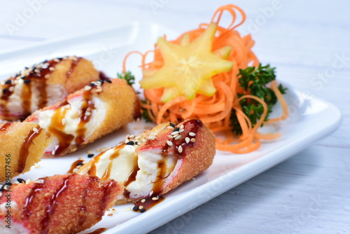 traditional Japanese food appetizer, with soy sauce, sesame seeds, vegetables