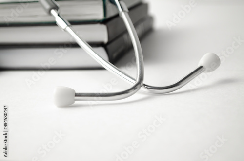 Beautiful stethoscope on book. Medical concept