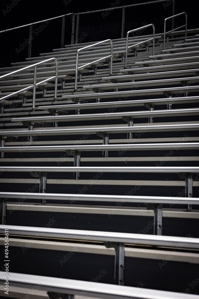 Bleachers of hight school stadium made out of metal benches Bleachers of hight school stadium made out of metal benches