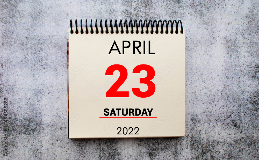April 23. 23th day of month, calendar date. Stand for desktop calendar on beige wooden background. April 23. 23th day of month, calendar date. Stand for desktop calendar on beige wooden background.