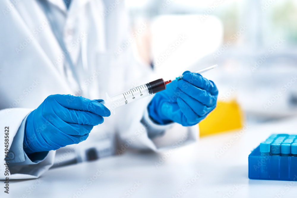 You have to work with extreme caution in the lab. Closeup shot of an unrecognisable scientist using a syringe while working in a lab. You have to work with extreme caution in the lab. Closeup shot of an unrecognisable scientist using a syringe while working in a lab.
