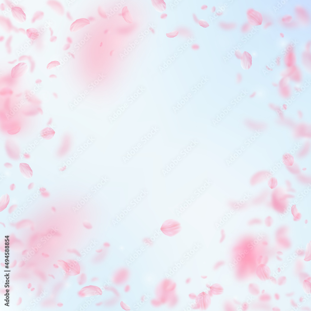 Sakura petals falling down. Romantic pink flowers vignette. Flying petals on blue sky square background. Love, romance concept. Extra wedding invitation.