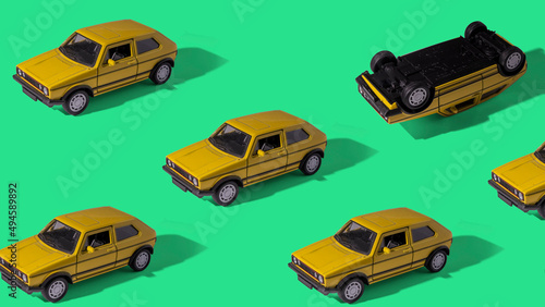 Car crash concept. Traffic safety awareness.  Yellow car in one color background. Pattern
