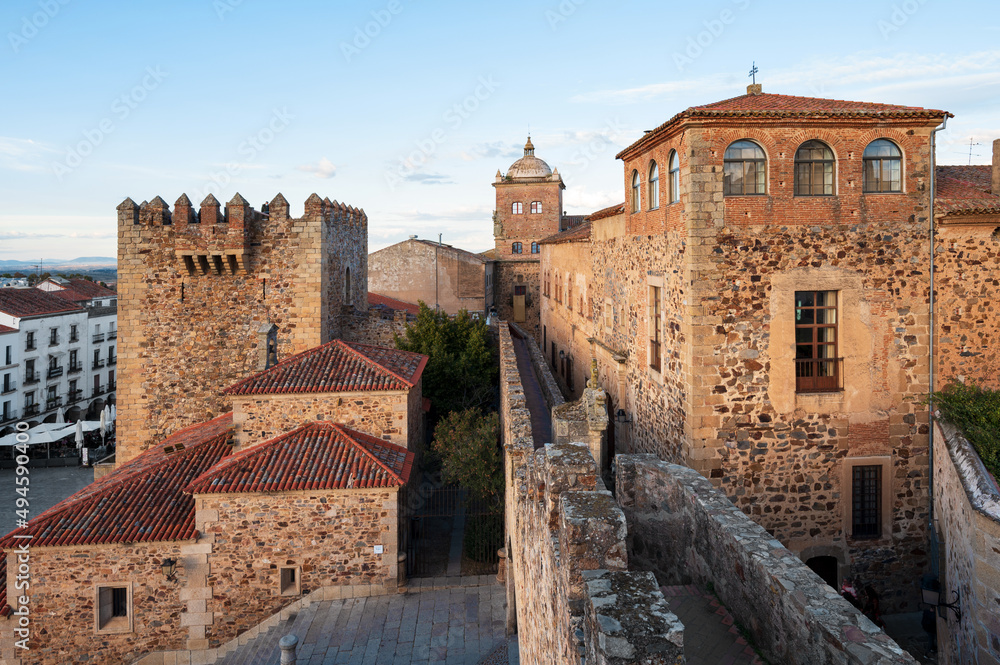 Scenic view of the medieval city of Caceres at twilight. High quality photo