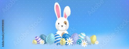 a cute white bunny behind colored eggs and flowers on a blue background