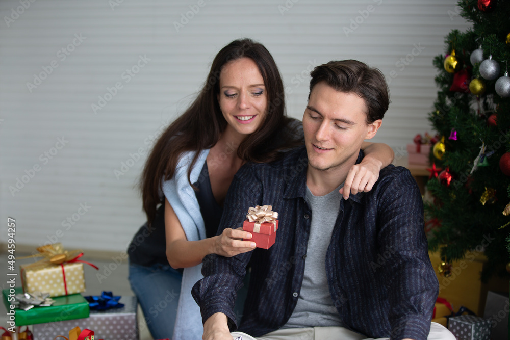 gift box present for a happy love of young couple romantic celebration in Christmas party gift box present for a happy love of young couple romantic celebration in Christmas party