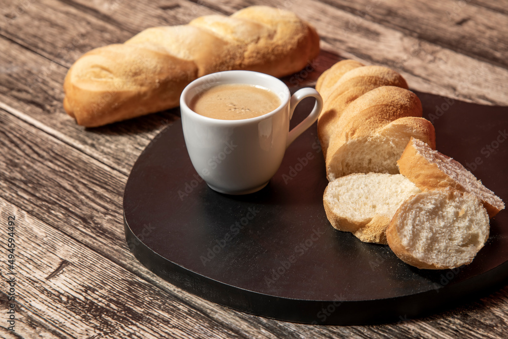 cup of coffee and bread cup of coffee and bread