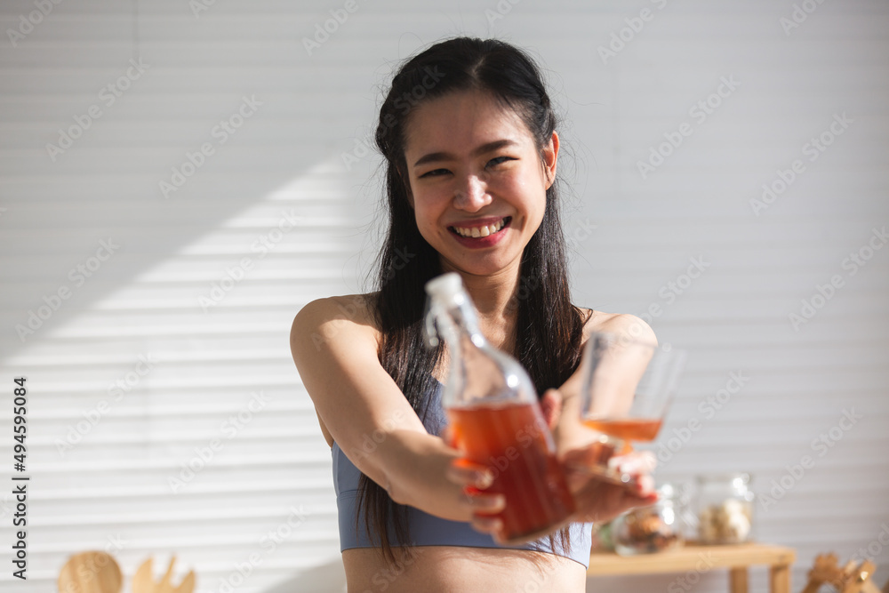 healthy food lifestyle of Asian woman with Kombucha tea drink, natural organic scoby pro biotic healthy food lifestyle of Asian woman with Kombucha tea drink, natural organic scoby pro biotic