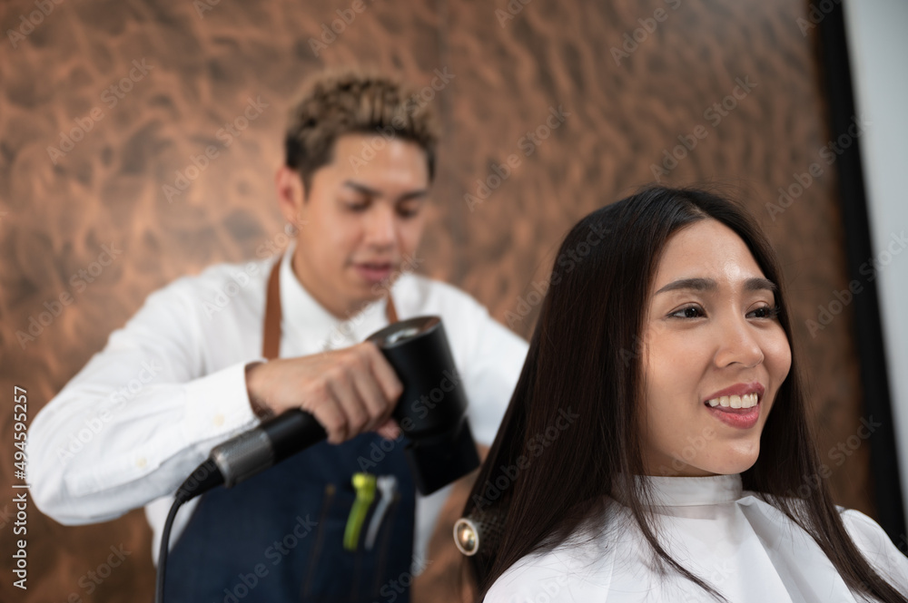 woman client person having a process to making treatment a hair with hairdresser in beauty salon woman client person having a process to making treatment a hair with hairdresser in beauty salon