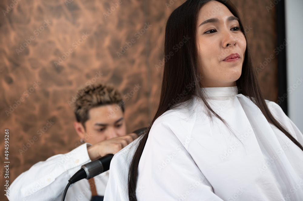 woman client person having a process to making treatment a hair with hairdresser in beauty salon woman client person having a process to making treatment a hair with hairdresser in beauty salon