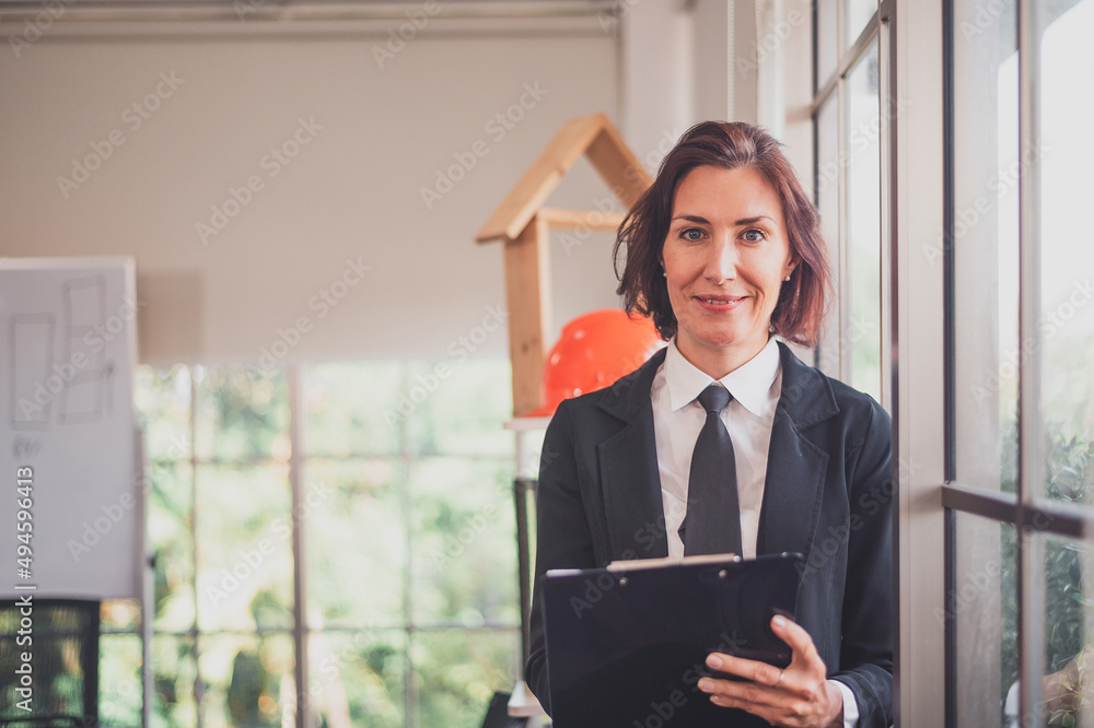 portrait businesswoman standing in company meeting room portrait businesswoman standing in company meeting room