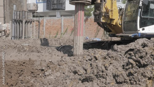 close up of a bore pile rig machine operate at the site. The machine used to driven pile for building foundation