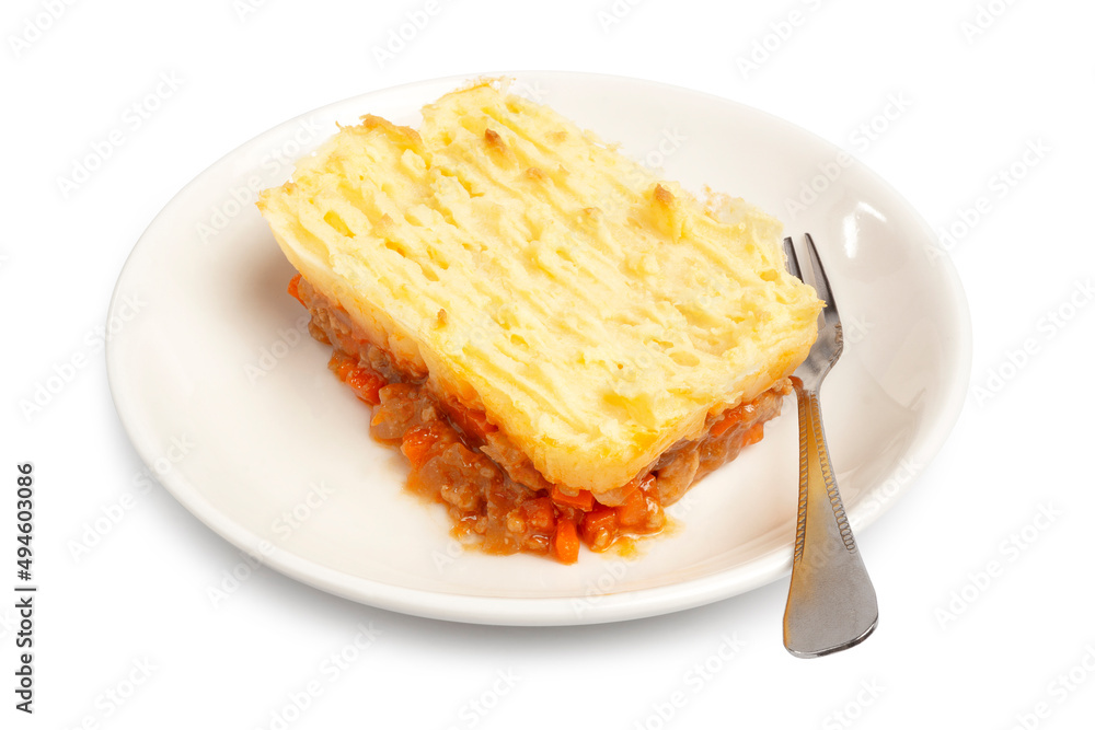 Shepherd's Pie, Traditional English Dish. Recipe with minced beef, lamb, carrot, onion, celery, topping with mashed potato baked in casserole isolated on white background. Clipping path. Shepherd's Pie, Traditional English Dish. Recipe with minced beef, lamb, carrot, onion, celery, topping with mashed potato baked in casserole isolated on white background. Clipping path.