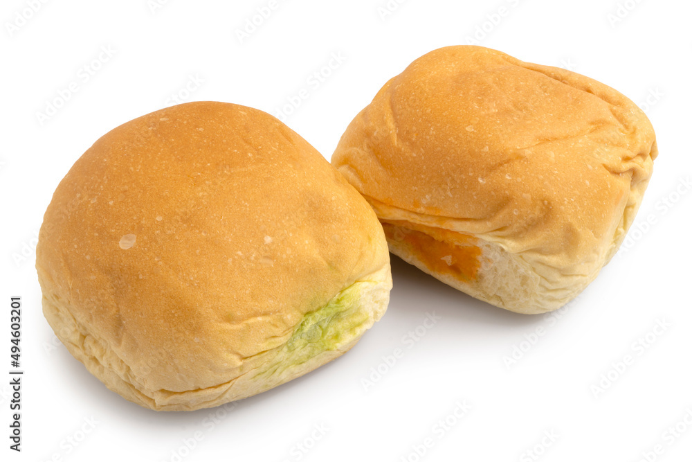 Close up of soft buns stuffed with sweet egg custard, Thai dessert custard bun isolated on white background. Clipping path. Close up of soft buns stuffed with sweet egg custard, Thai dessert custard bun isolated on white background. Clipping path.