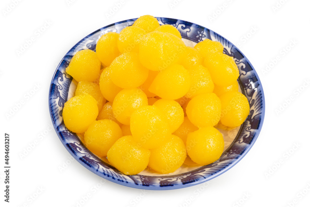 Golden Egg Yolk Drops called Thong Yod in Thai, traditional Thai sweets made from egg yolks and sugar, isolated on white background. Clipping path Golden Egg Yolk Drops called Thong Yod in Thai, traditional Thai sweets made from egg yolks and sugar, isolated on white background. Clipping path