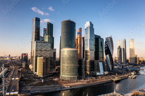 urban industrial landscape in the morning at sunrise shot from a drone 