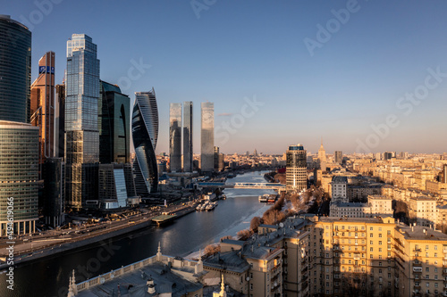 urban industrial landscape in the morning at sunrise shot from a drone 