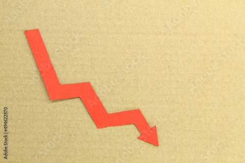 Obraz na plátne the red arrow descends. the concept of plummeting rates