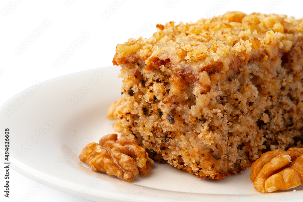 Slice of nut cake isolated on white background Slice of nut cake isolated on white background