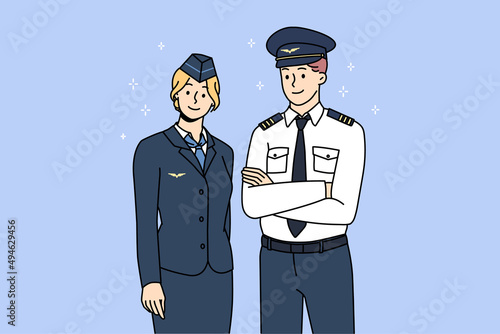 Wallpaper Mural Professional airplane crew in uniform posing for picture together